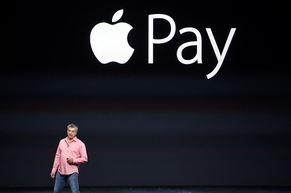 Eddy Cue, Apple's senior vice president of Internet Software and Service, introduces Apple Pay during an Apple event at the Flint Center in Cupertino